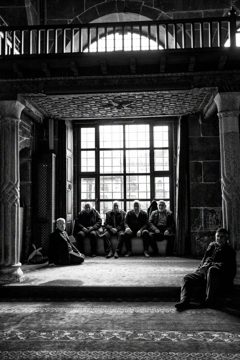 Some men inside the mosque pose for a photo