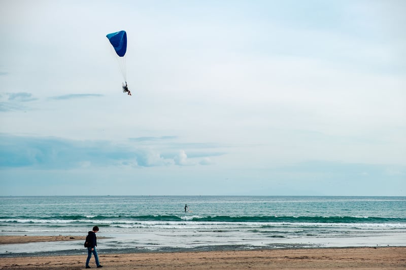 A man flying over Kamakura beach