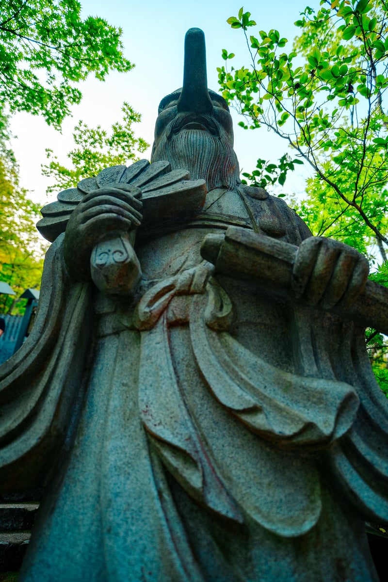 A funny statue with a long nose in the Daisho-in temple.