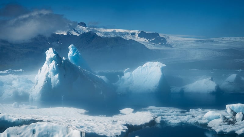 Blocks of ice float in the glacial lake beneath Vatnajökull, the biggest glacier in Europe
