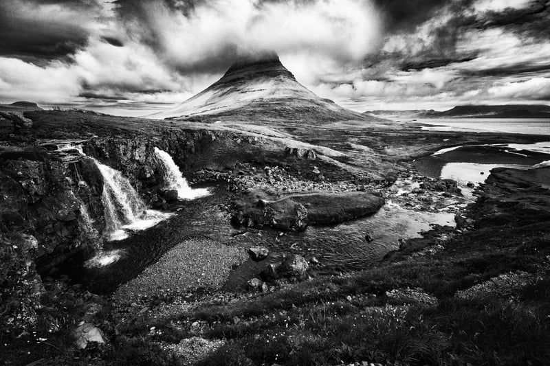 The famous mountain of Kirkjufell and its fall Kirkjufellsfoss