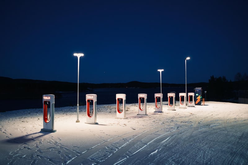 A EV charging station in a surreal landscape.
